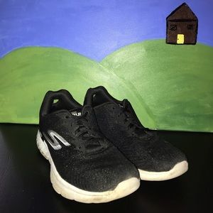 Black sketchers sneakers